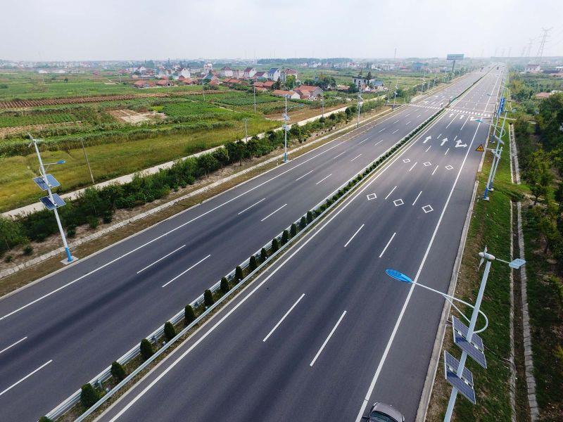 1.主图：临海高等级公路BT工程，全长521公里，是当时江苏省规模最大、里程最长、技术最复杂的高速公路。